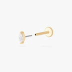 This is an image of a 14k gold flatback with a marquise setting and clear stone. color:null|14k gold/clear