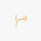 This is an image of a 14k gold flatback stud that is shaped like a lightning bolt.