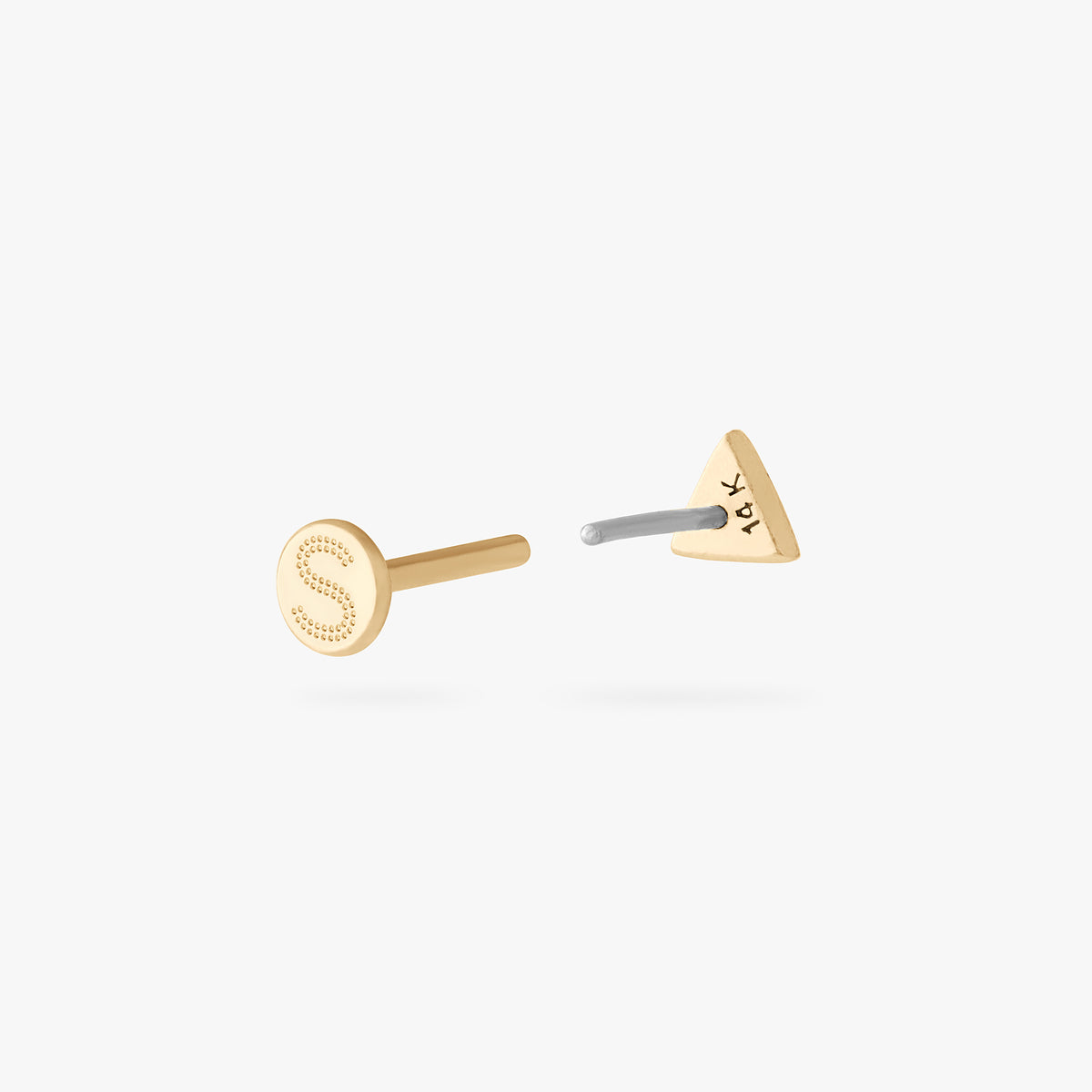 This is a back image of a 14k gold flatback stud that is a solid gold triangle shape separated from the labret 