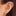 This is an image of a 14k gold flatback stud that is a solid gold triangle shape on ear. [hover] color:null|14k gold
