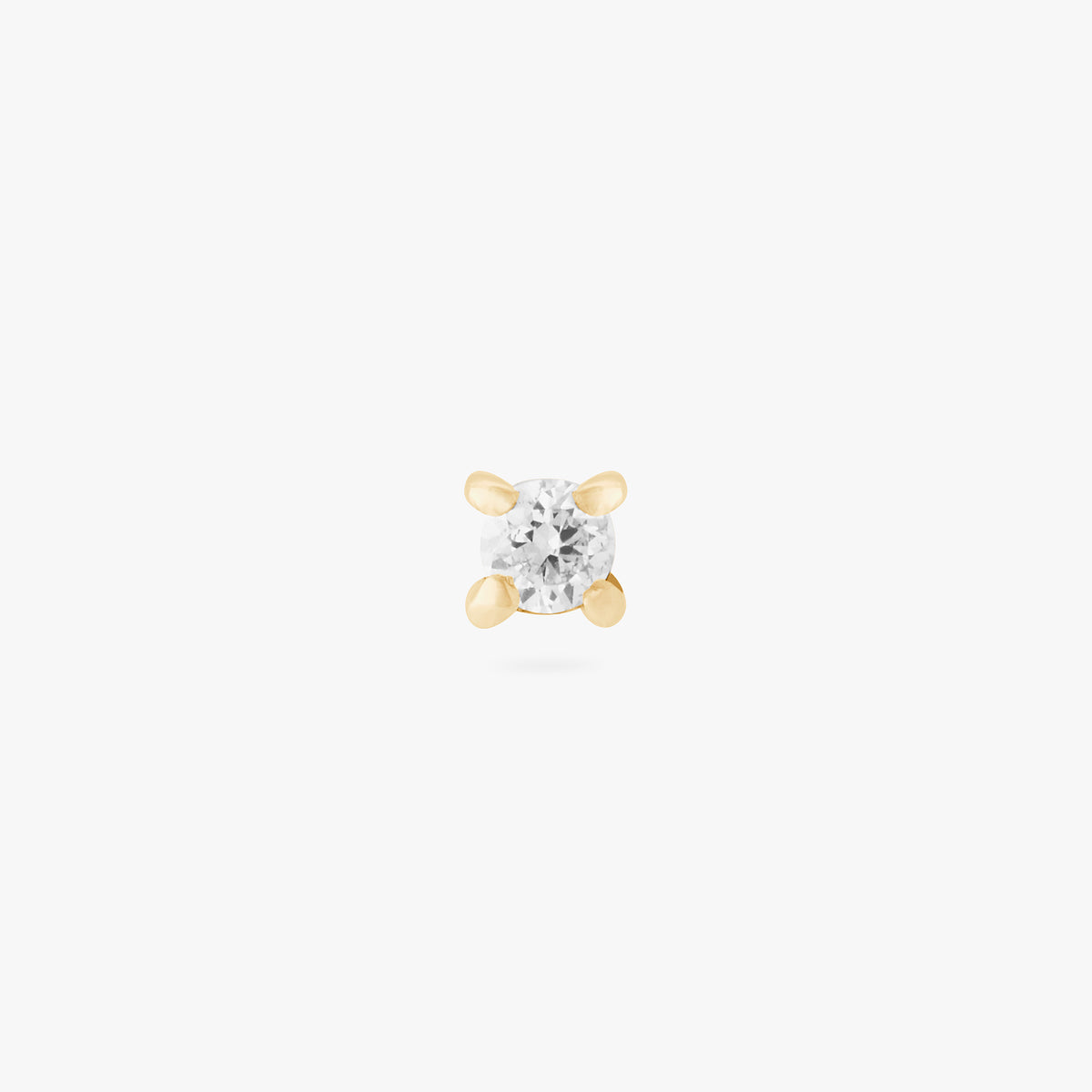 This image is a 14K gold flatback stud with a diamond against a white background. 