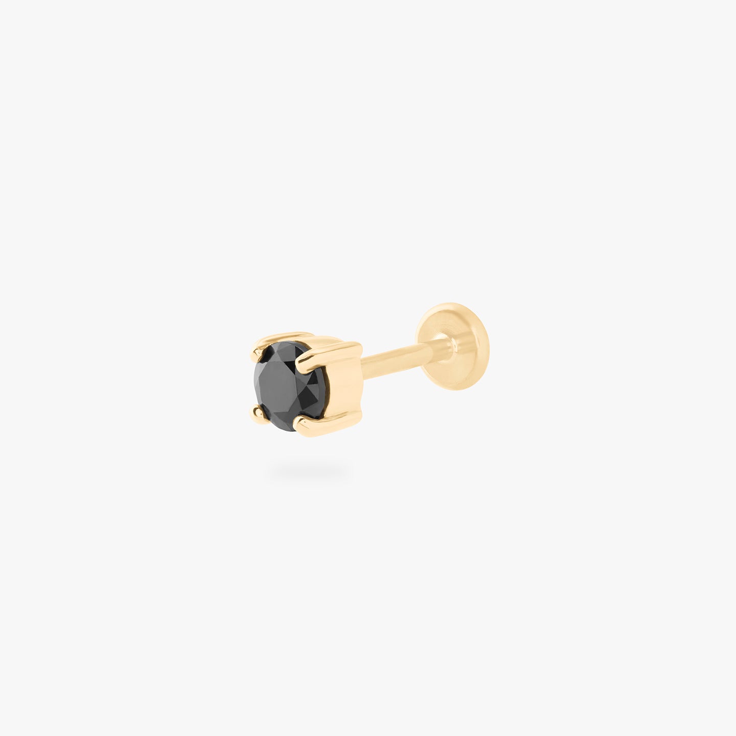 a 14k 4mm cz flatback stud with a black cz stone color:null|gold/black