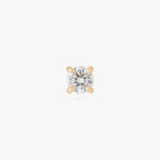 This image is a 14K gold flatback stud with a crystal cz stone against a white background. 
