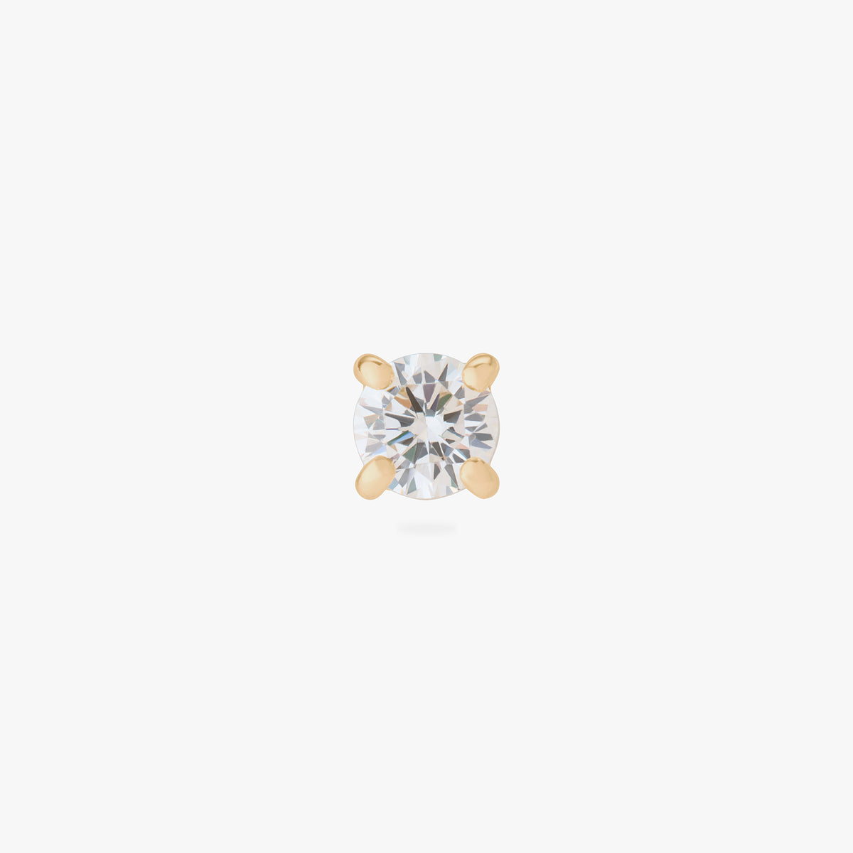 This image is a 14K gold flatback stud with a crystal cz stone against a white background. 