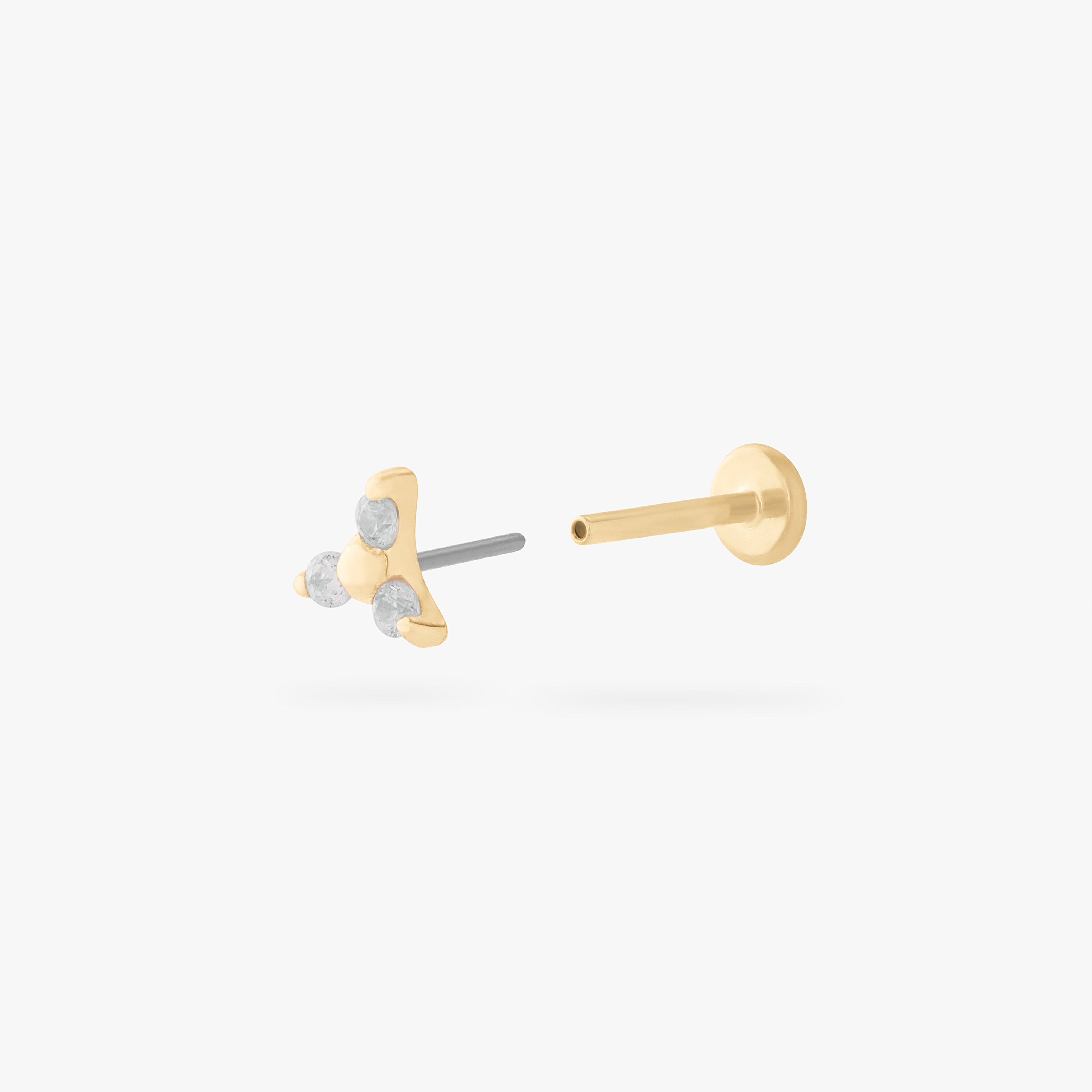 This is an image of a gold flatback stud that has 3 cz stones in the shape of a triangle. - Alternative view 3