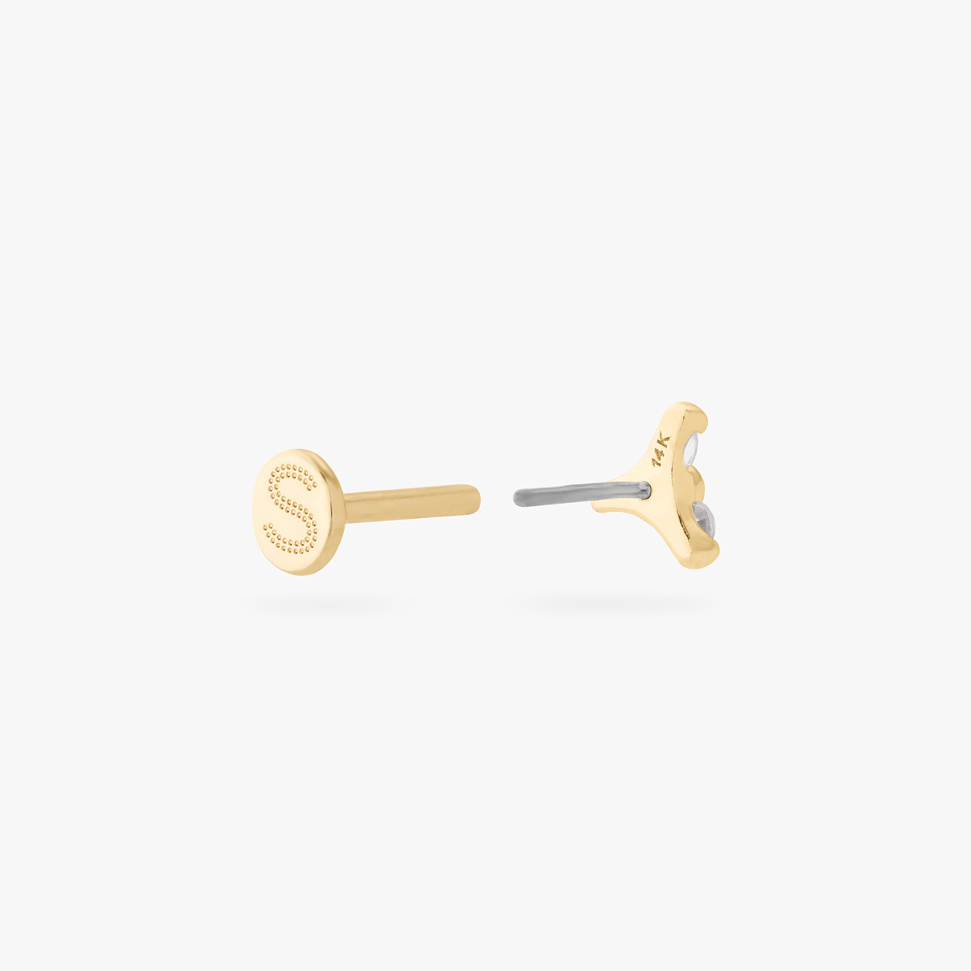 This is an image of a gold flatback stud that has 3 cz stones in the shape of a triangle. - Alternative view 4