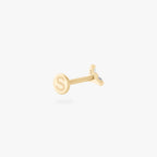This is an image of a gold flatback stud that has 3 cz stones in the shape of a triangle. color:null|14k gold