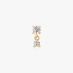 This image is a 14K gold flatback stud that features a larger crystal CZ stone with a smaller crystal CZ stone dangling from it against a white background.