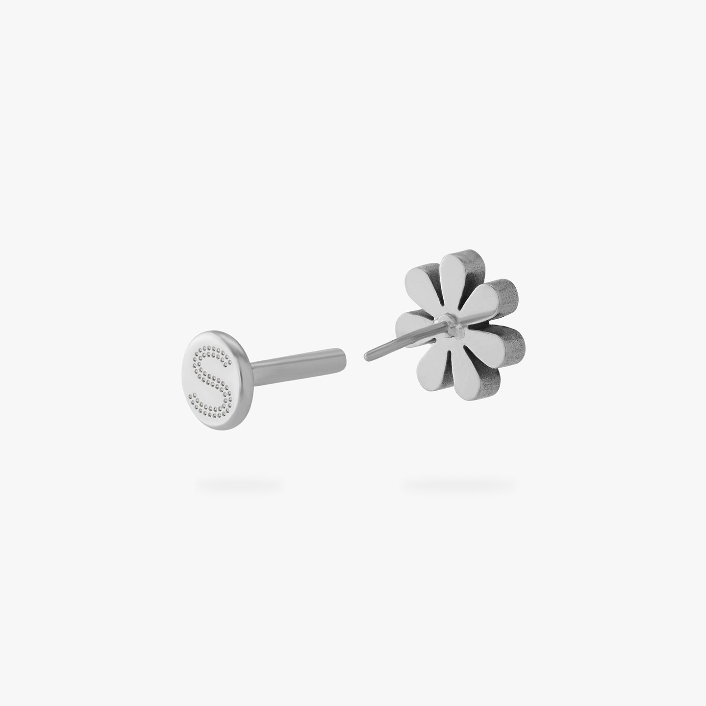 titanium cz daisy flatback stud with a mini black cz in the center color:null|silver/black