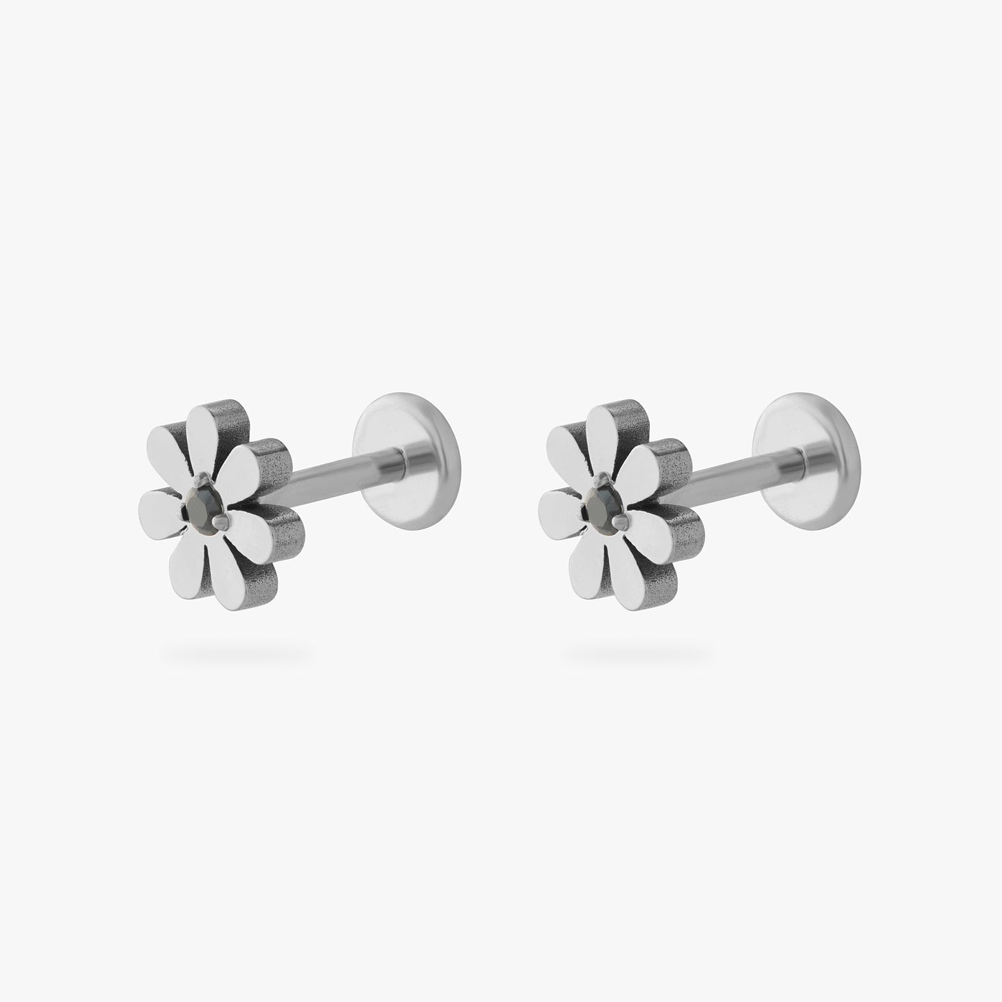 titanium cz daisy flatback stud with a mini black cz in the center [pair] color:null|silver/black