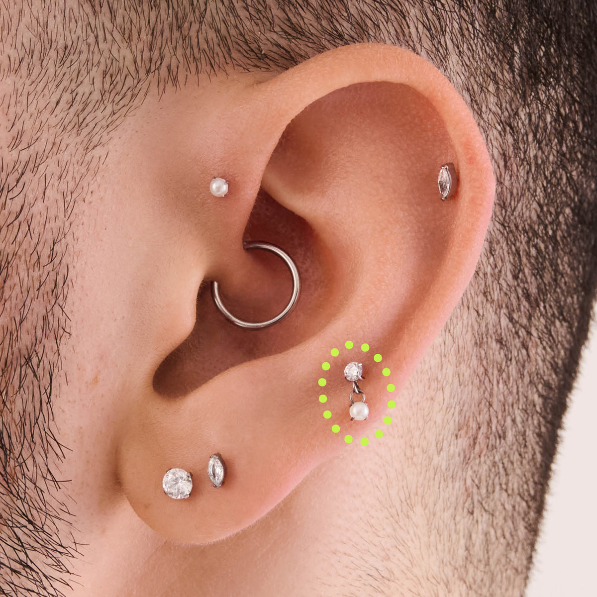 on ear featuring a titanium cz dangle flatback with a clear cz stone and a synthetic pearl - Alternative view 1