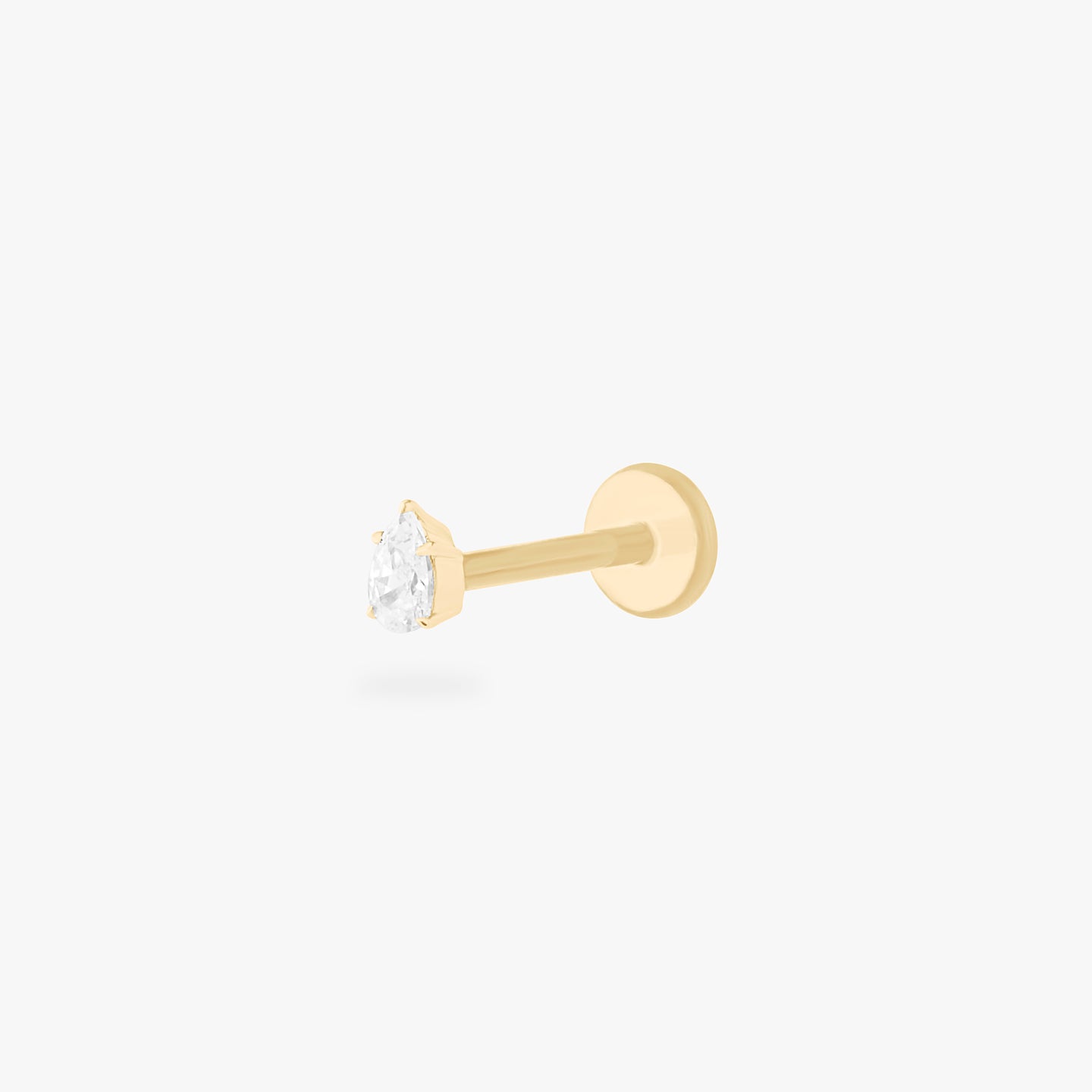 This is a 14K gold flatback stud with a pear shaped crystal cz stone. color:null|crystal