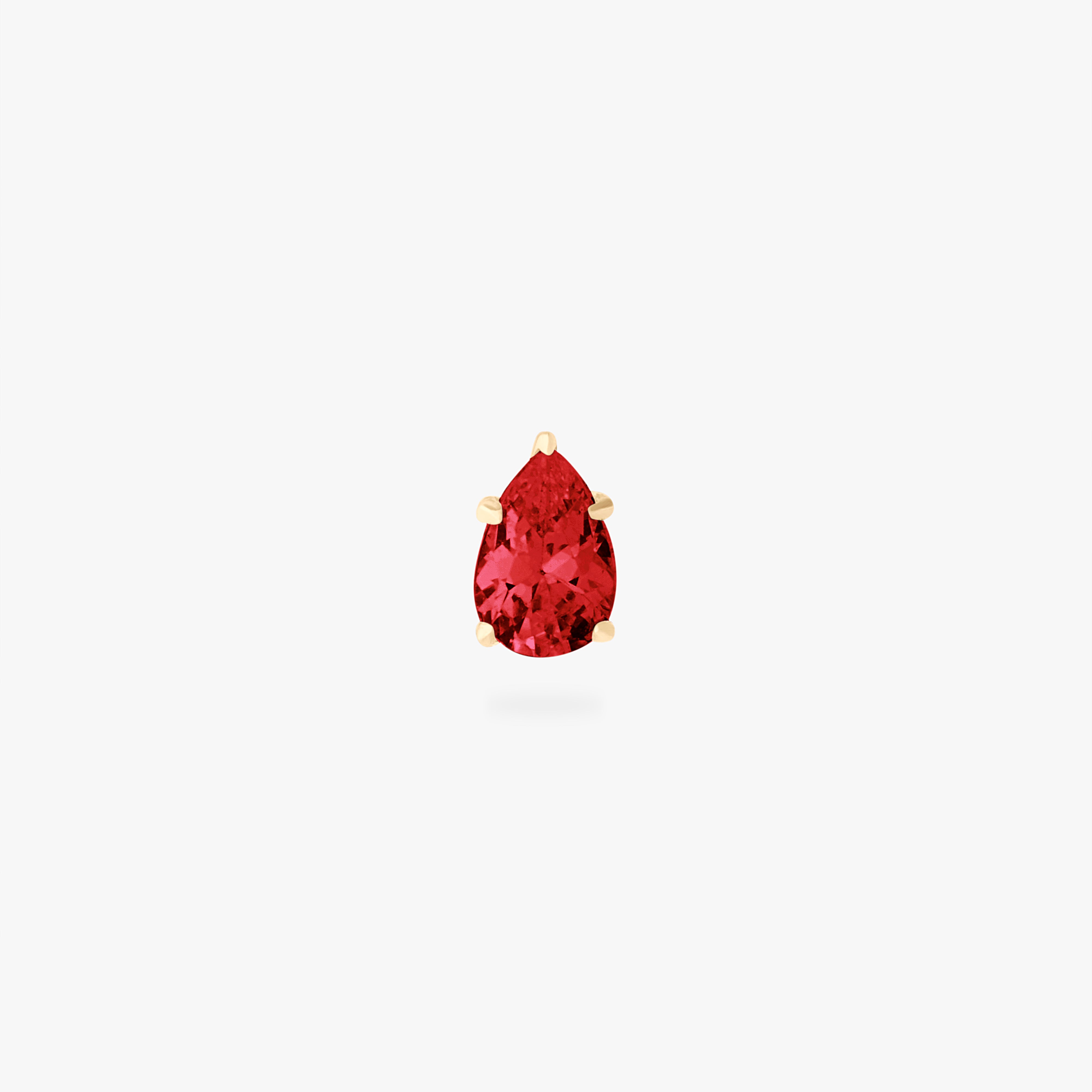 This is a 14K gold flatback stud with a pear shaped garnet cz stone. color:null|garnet