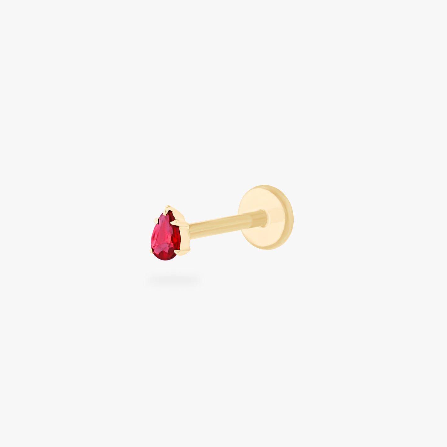 This is a 14K gold flatback stud with a pear shaped garnet cz stone. color:null|garnet