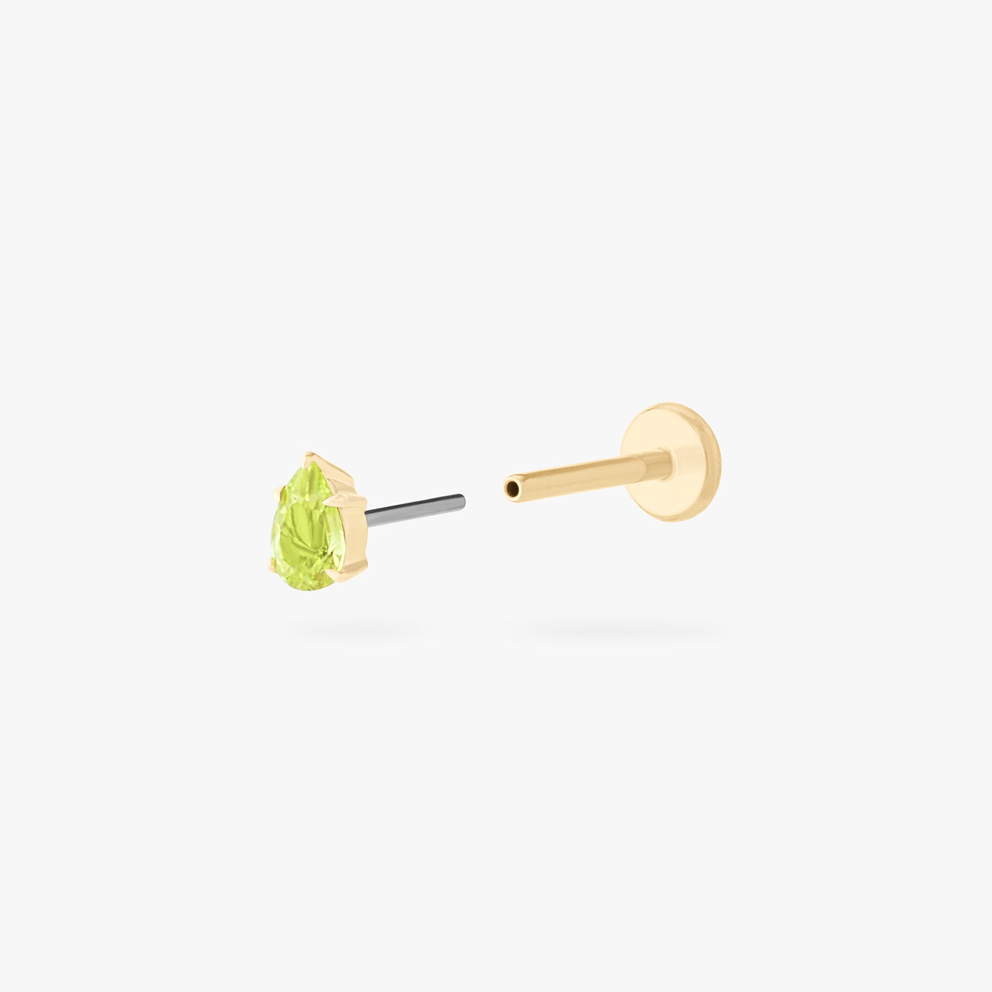 This is a 14K gold flatback stud with a pear shaped peridot cz stone. color:null|peridot