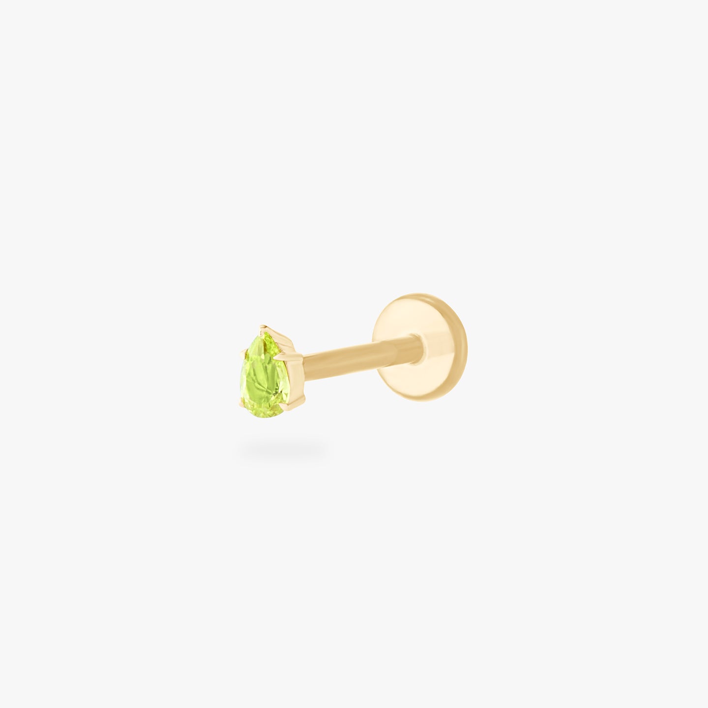 This is a 14K gold flatback stud with a pear shaped peridot cz stone. color:null|peridot