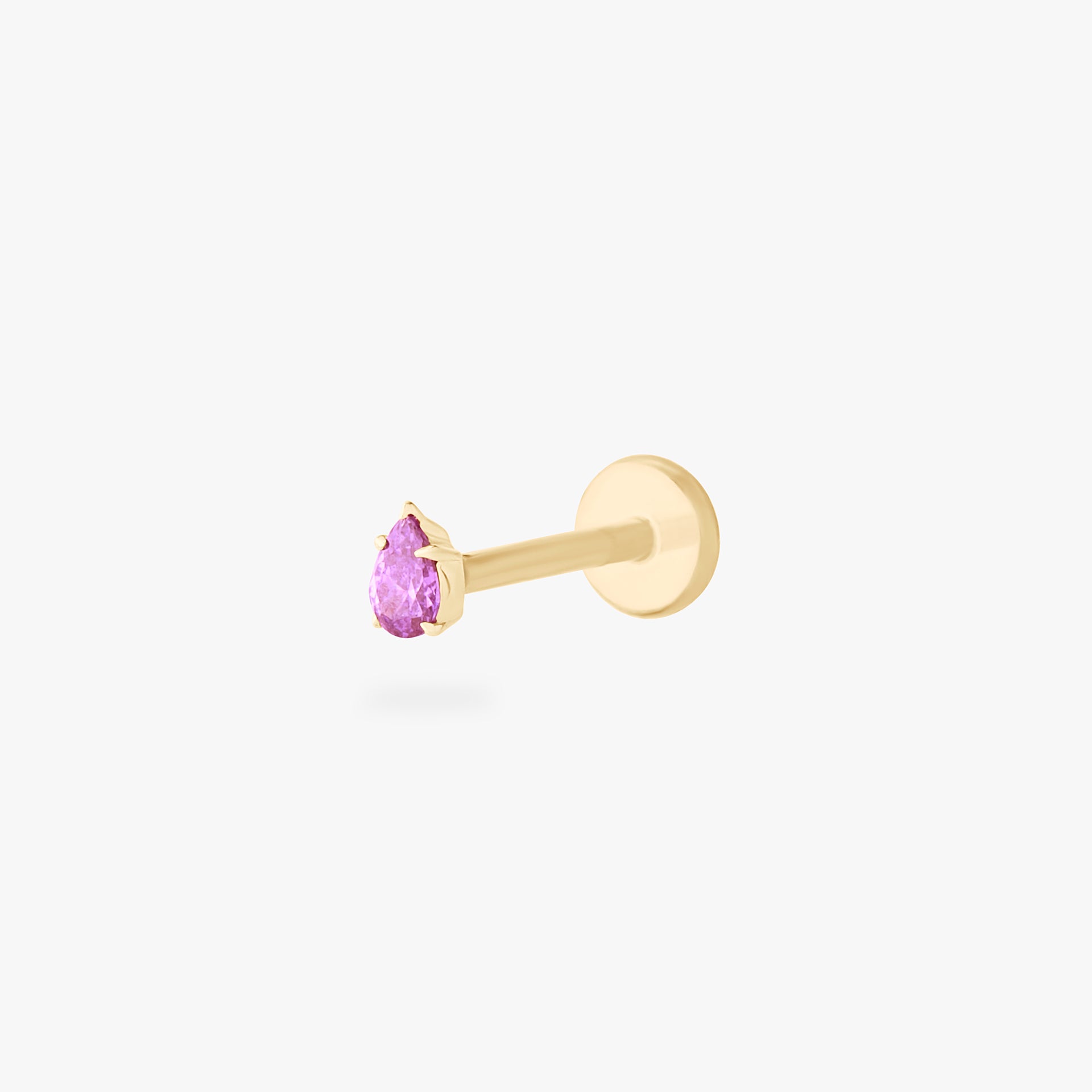 This is a 14K gold flatback stud with a pear shaped tourmaline cz stone. - Main view