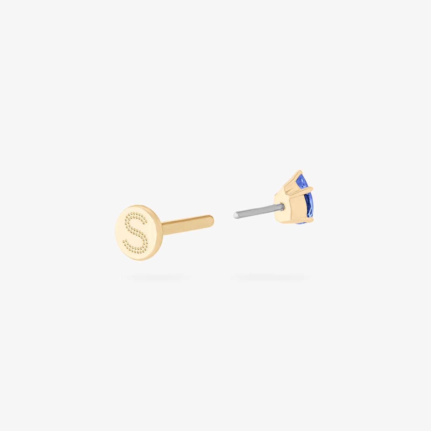 This is a 14K gold flatback stud with a pear shaped sapphire cz stone. color:null|sapphire