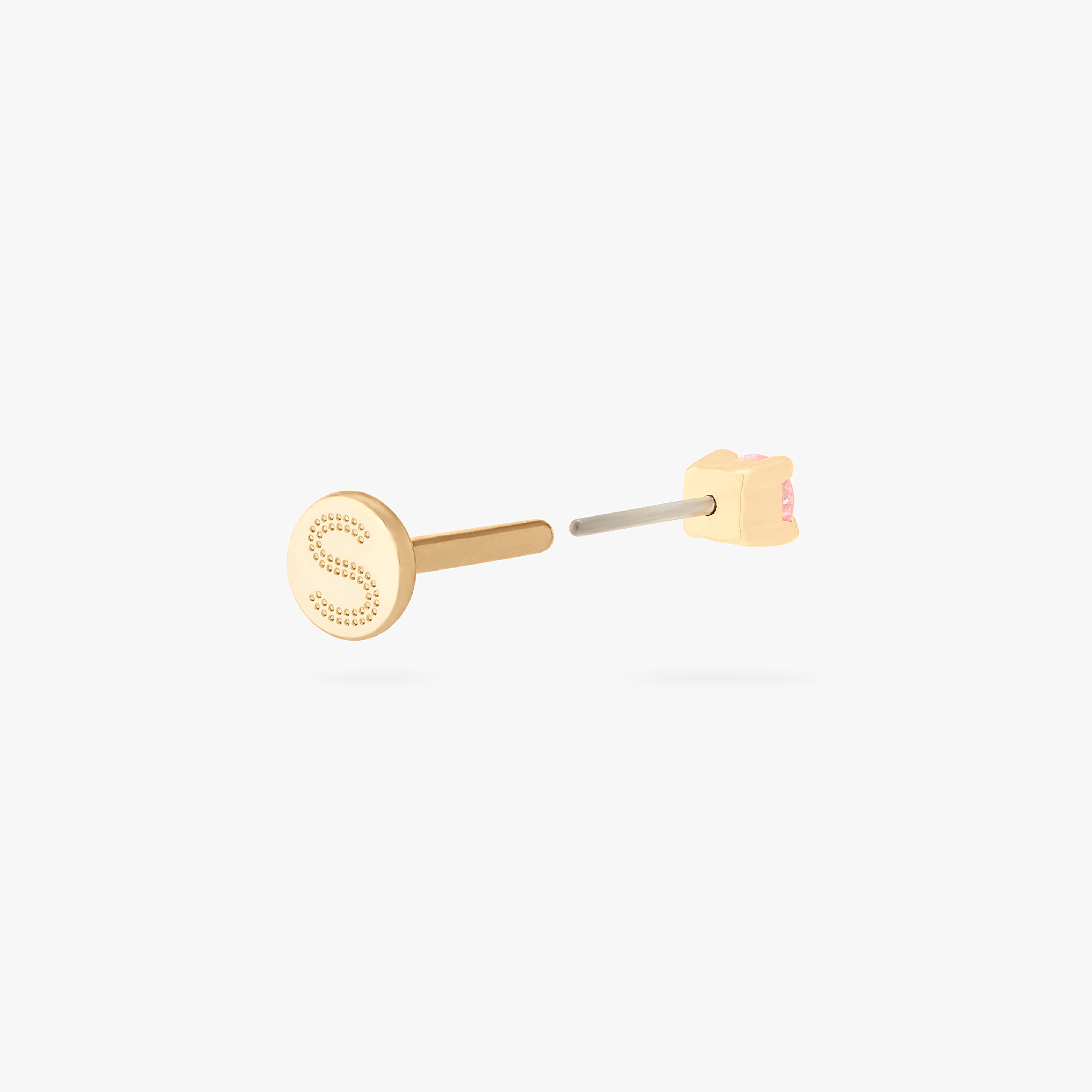 This image shows a flatback stud made of 14K gold with a round pink diamond stone facing backwards and the gold-toned labret back removed. - Alternative view 4