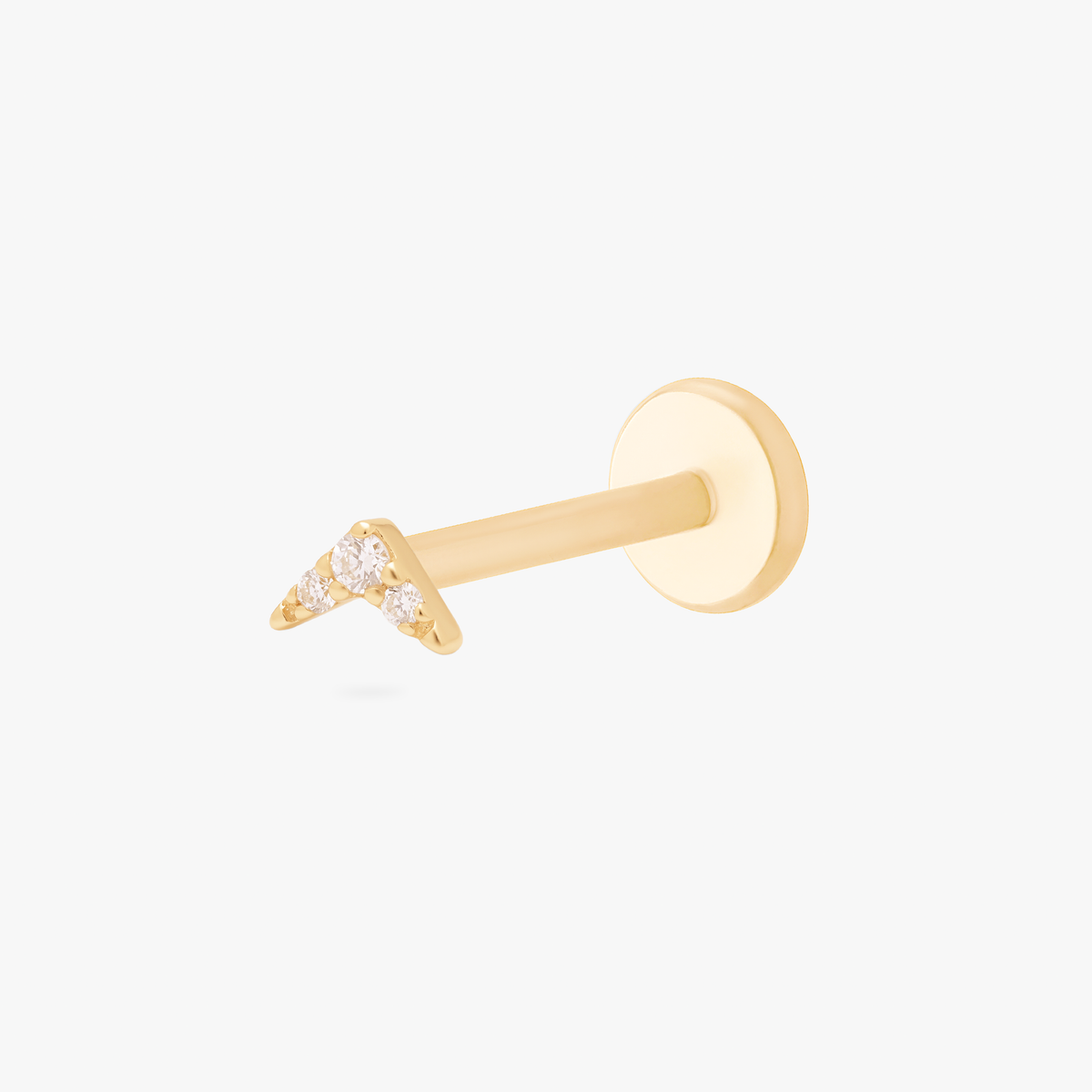 this image shows the side view of a 14k gold micro pave v connected to labret