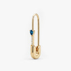 This is an image of a 14k yellow gold plated brass earring shaped like a safety pin with a blue pear cut CZ stone and 5 clear accent stones below the pear CZ. 