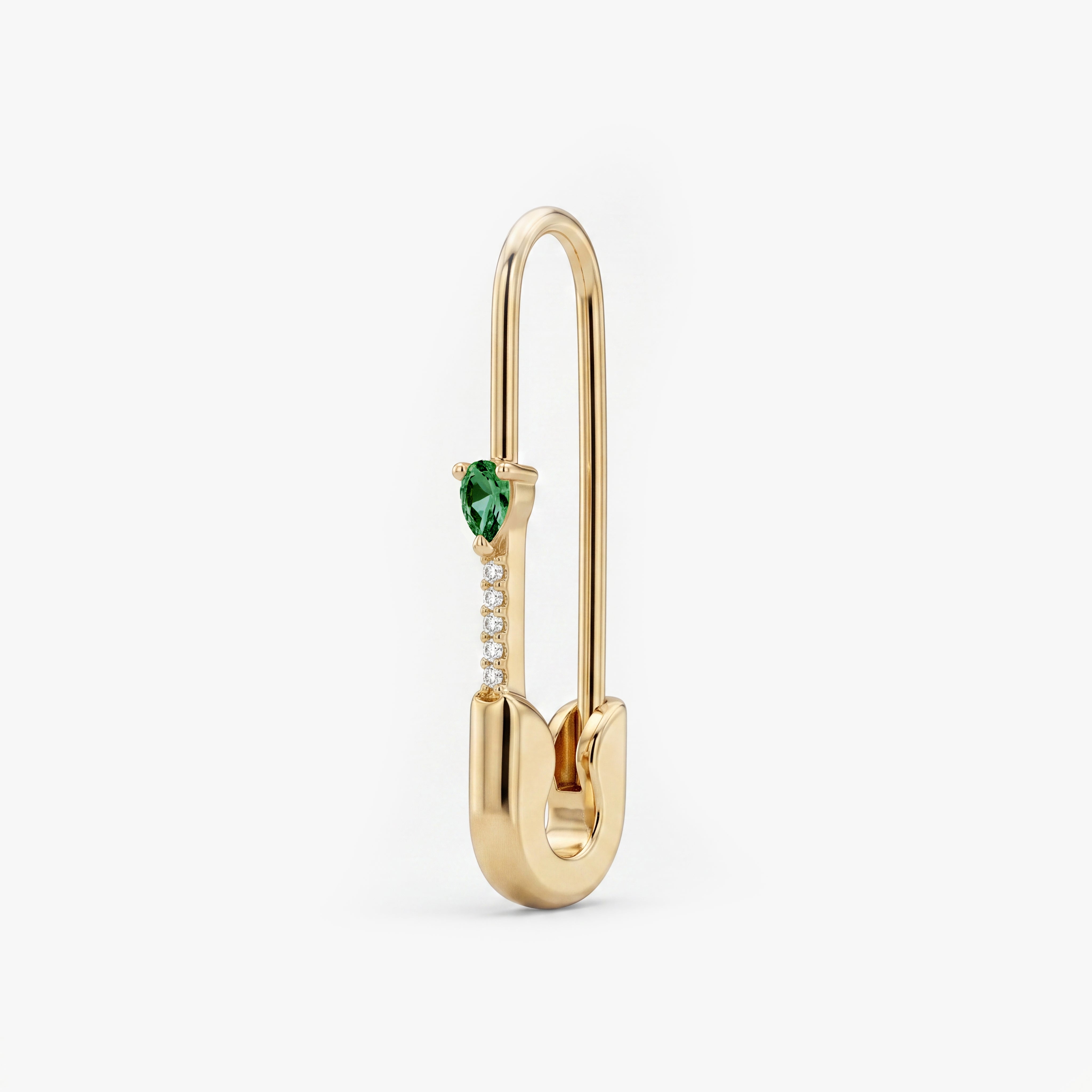 This is an image of a 14k yellow gold plated brass earring shaped like a safety pin with a green, pear cut CZ stone and 5 clear accent stones below the pear CZ. - Main view