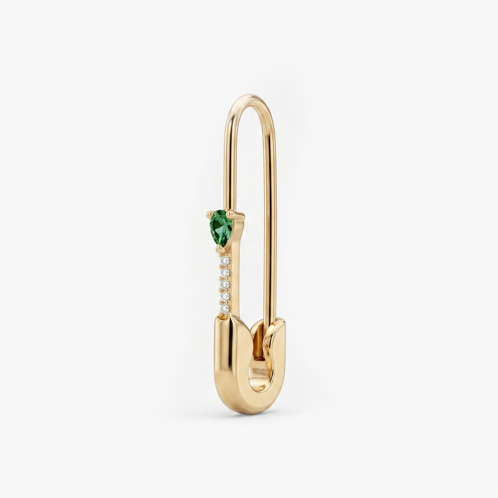 This is an image of a 14k yellow gold plated brass earring shaped like a safety pin with a green, pear cut CZ stone and 5 clear accent stones below the pear CZ. - Main view