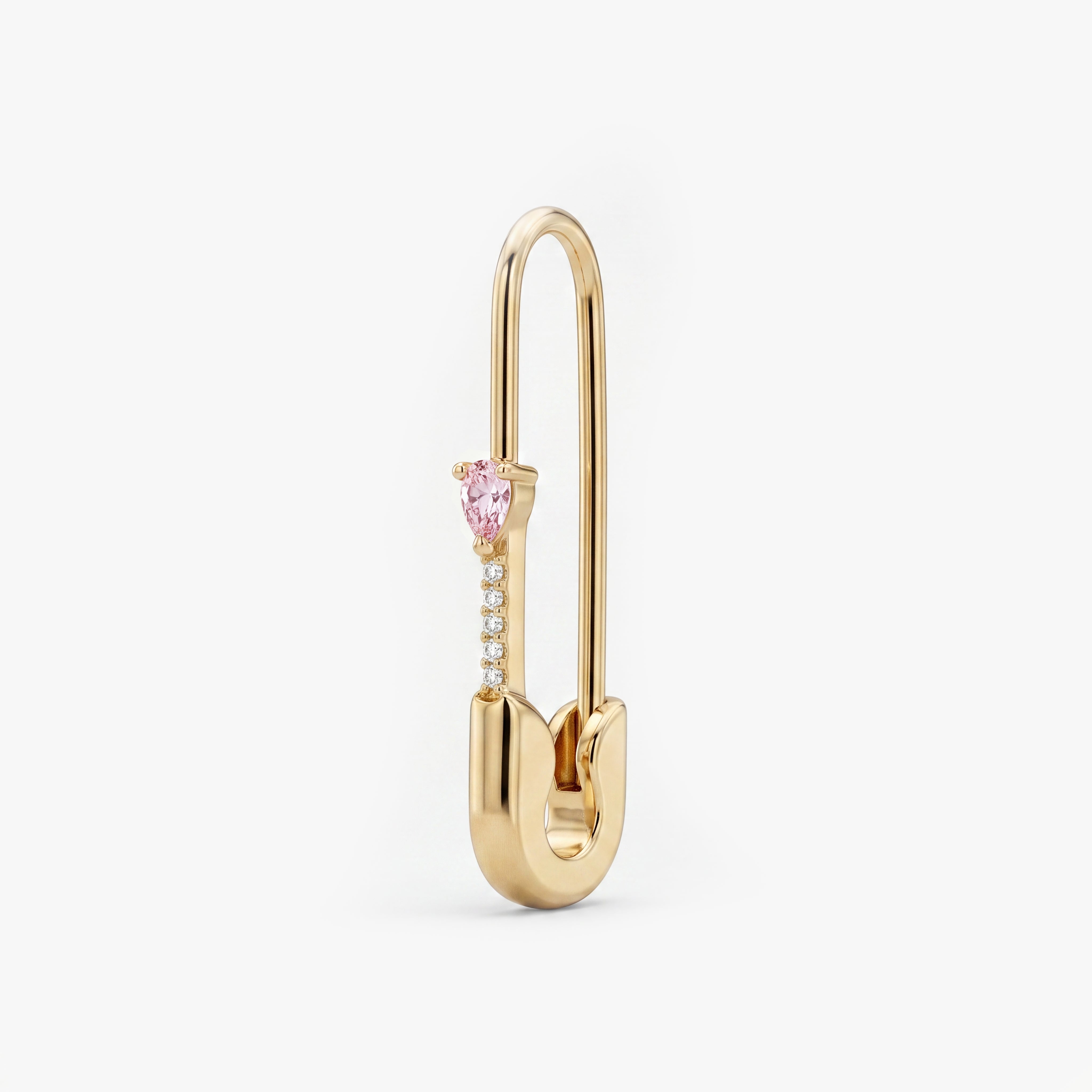 This is an image of a 14k yellow gold plated brass earring shaped like a safety pin with a pink pear cut CZ stone and 5 clear accent stones below the pear CZ. - Main view