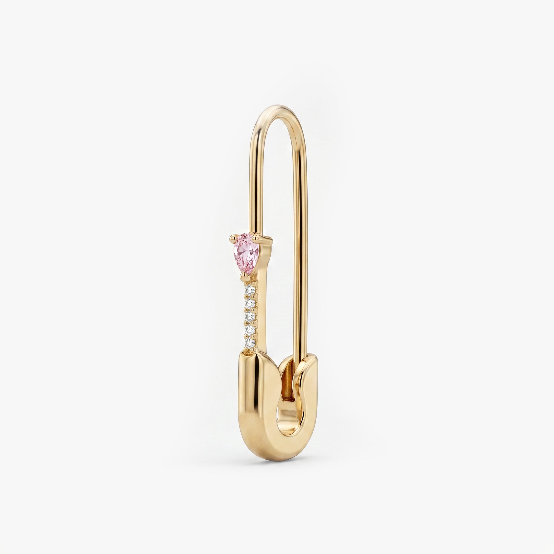 This is an image of a 14k yellow gold plated brass earring shaped like a safety pin with a pink pear cut CZ stone and 5 clear accent stones below the pear CZ. - Main view