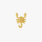 This image shows the front view of the golden titanium scorpion flatback. 