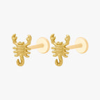 This image shows the side view of a pair of the golden titanium scorpion flatbacks 