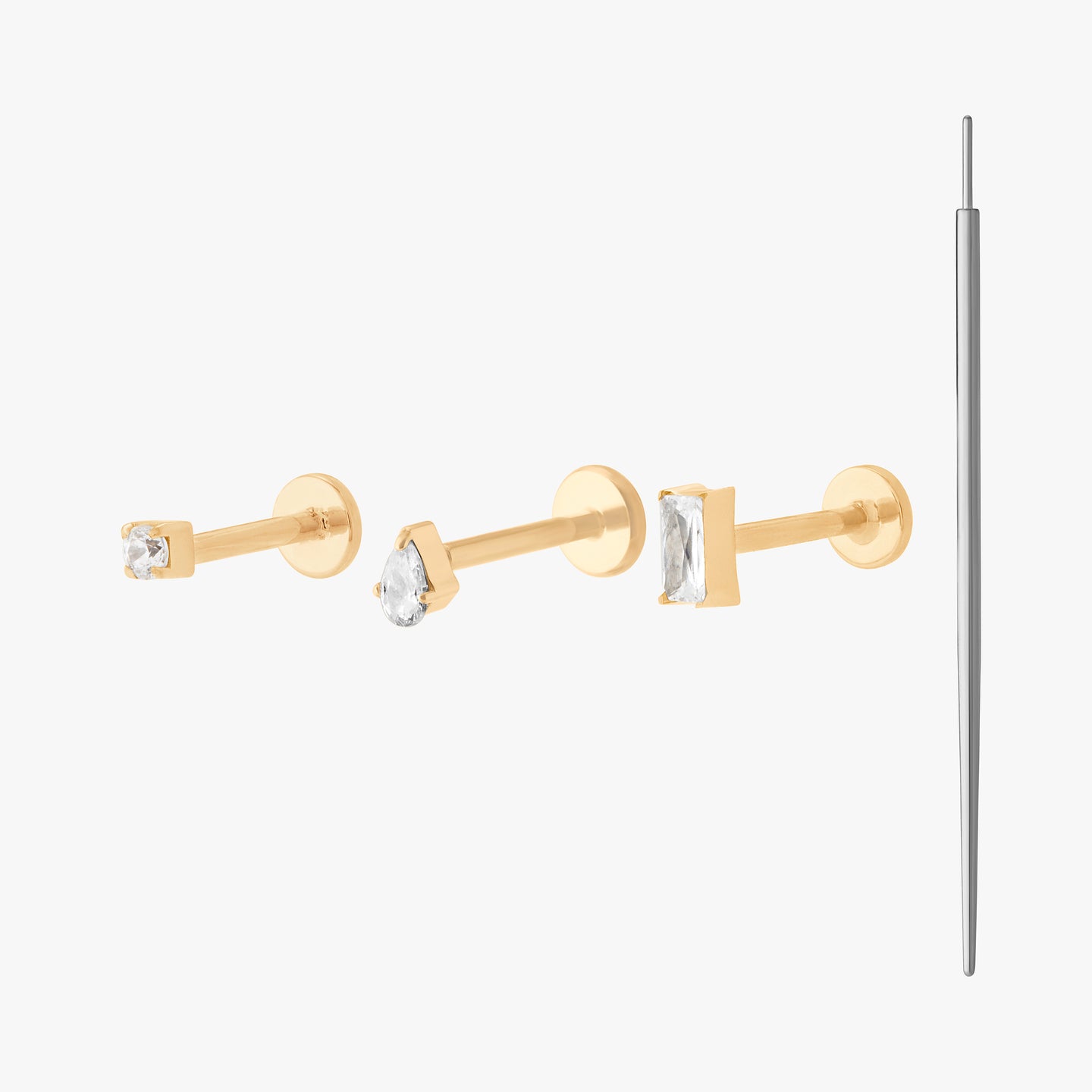 set of flatbacks with an insertion tool color:null|gold/clear