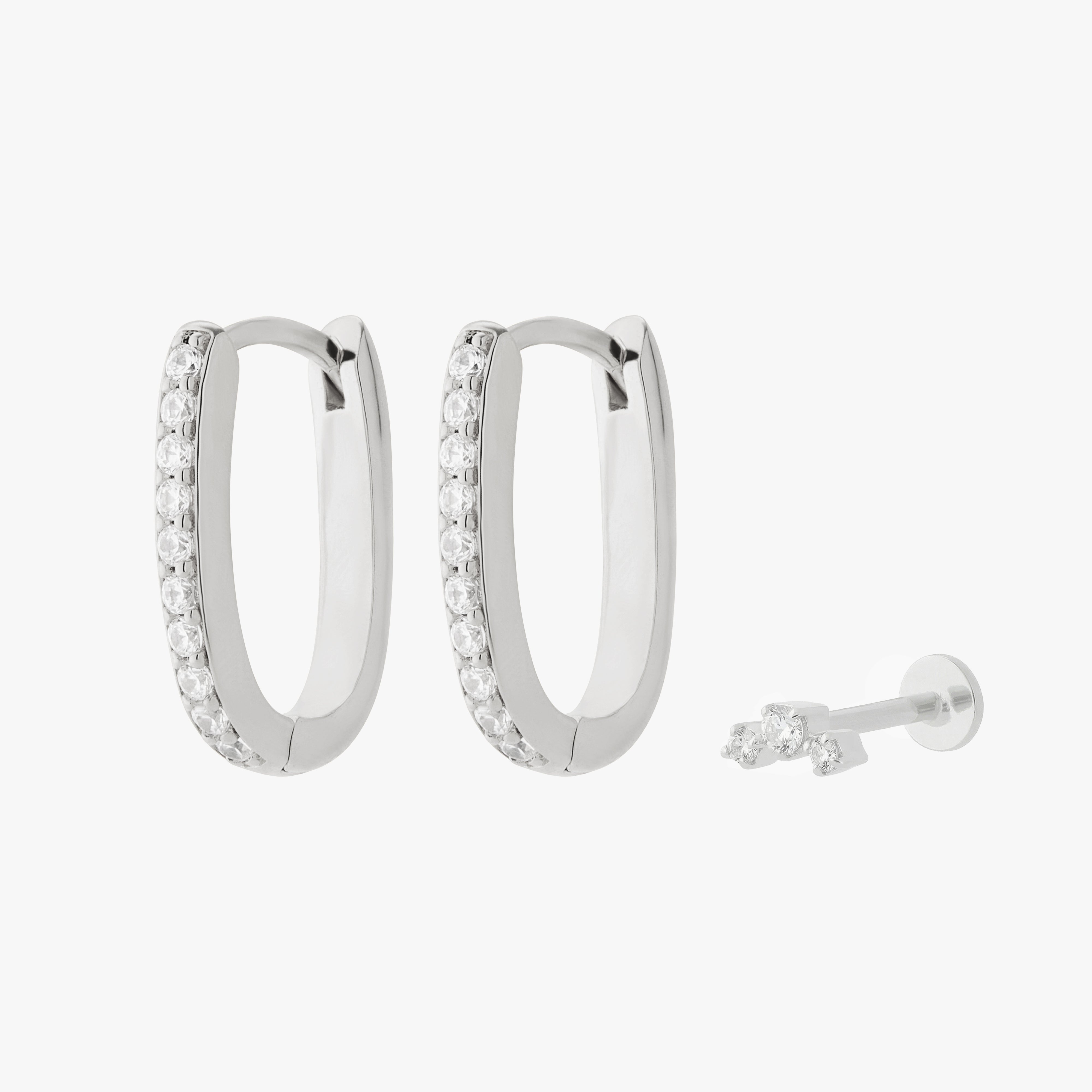 Silver earscape featuring a pair of Pave Oval Hoops and a micro cluster flatback stud with clear stones - Main view