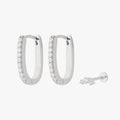 Silver earscape featuring a pair of Pave Oval Hoops and a micro cluster flatback stud with clear stones