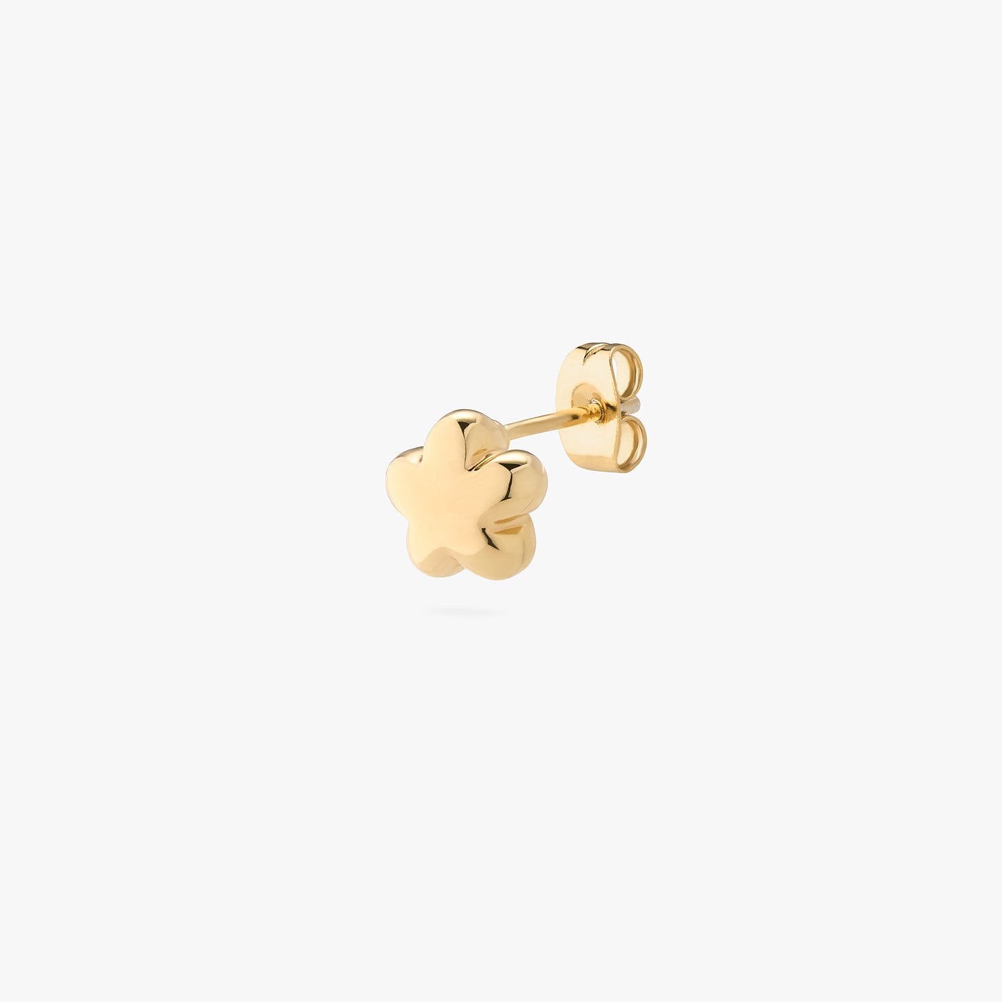 A gold puffy daisy-shaped stud. color:null|gold