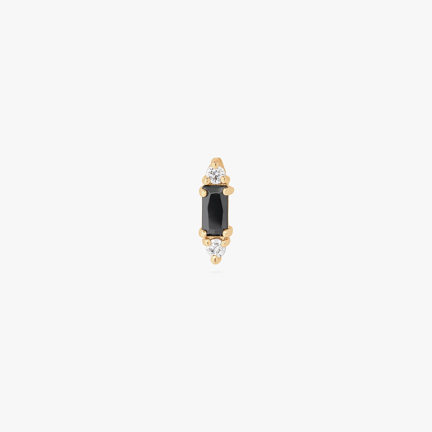 A black baguette-shaped CZ stud with two gold/clear CZs on the end of the baguette. color:null|gold/black