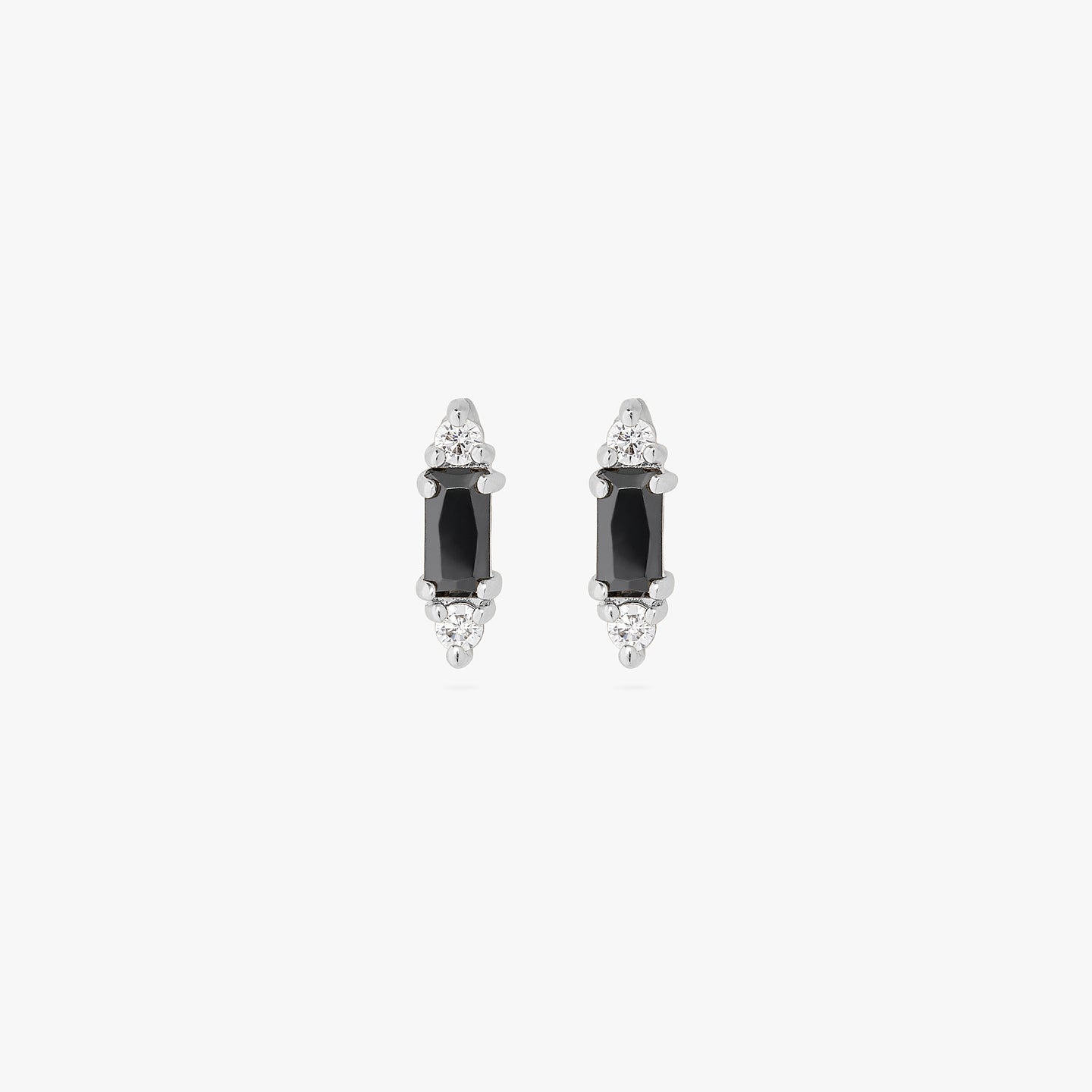 A pair of black baguette-shaped CZ studs with two silver/clear CZs on the end of the baguette. color:null|silver/black