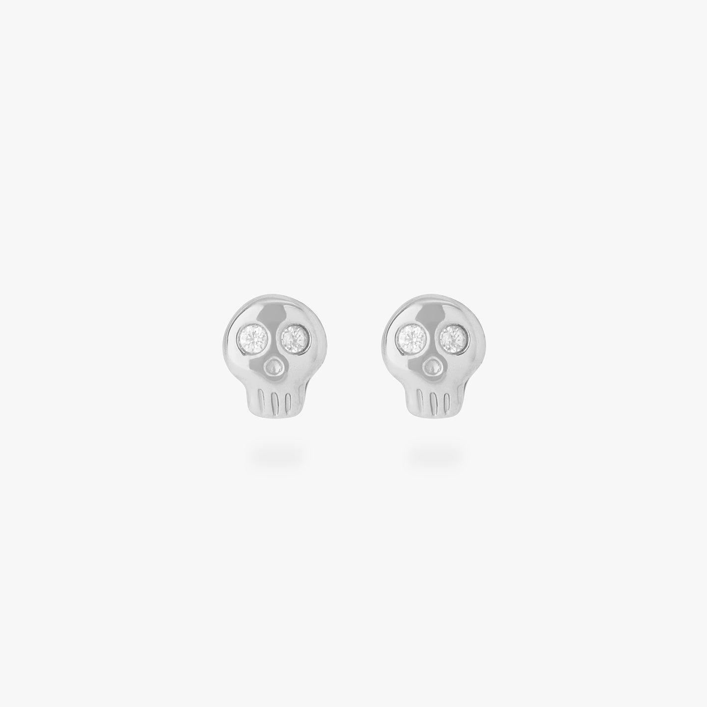 micro cz skull stud in silver with cz accent eyes [pair] color:null|silver/clear