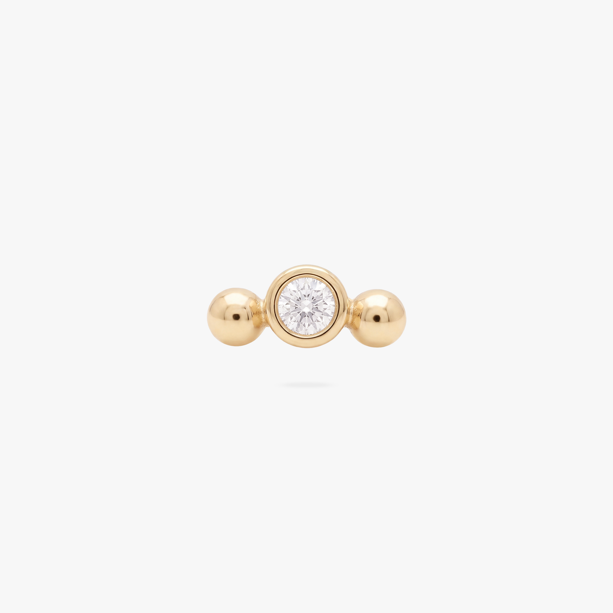 Gold flatback earring with a small center bezel stone with 2 small balls on either side