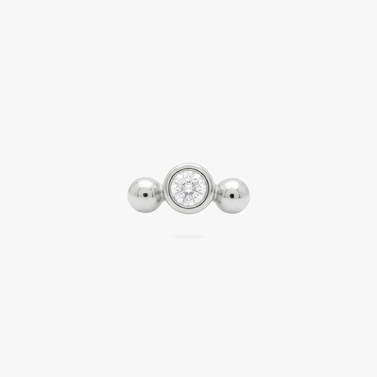 Silver flatback earring with a small bezel center stone with 2 small balls on either side