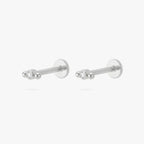 Pair of silver micro bezel cluster flatbacks with a small bezel stone in the middle and 2 small balls on either side