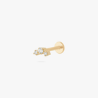 Micro gold cluster flatback stud with 3 small cz stones on a white background