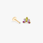 This image shows the side view of the Anodized Stone Crown Flatback separated from labret. The flatback has a green pear cz stone in the middle, two purple cz baguette stones on either side and two pink circular cz stones on the outer side of the baguette stones. 