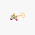 This image shows the side view of the Anodized Stone Crown Flatback. The flatback has a green pear cz stone in the middle, two purple cz baguette stones on either side and two pink circular cz stones on the outer side of the baguette stones. 