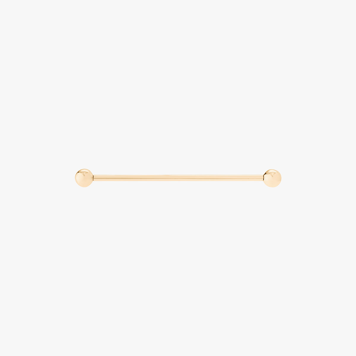This is an image of a 14K gold industrial bar that is 38mm in length against a white background. 