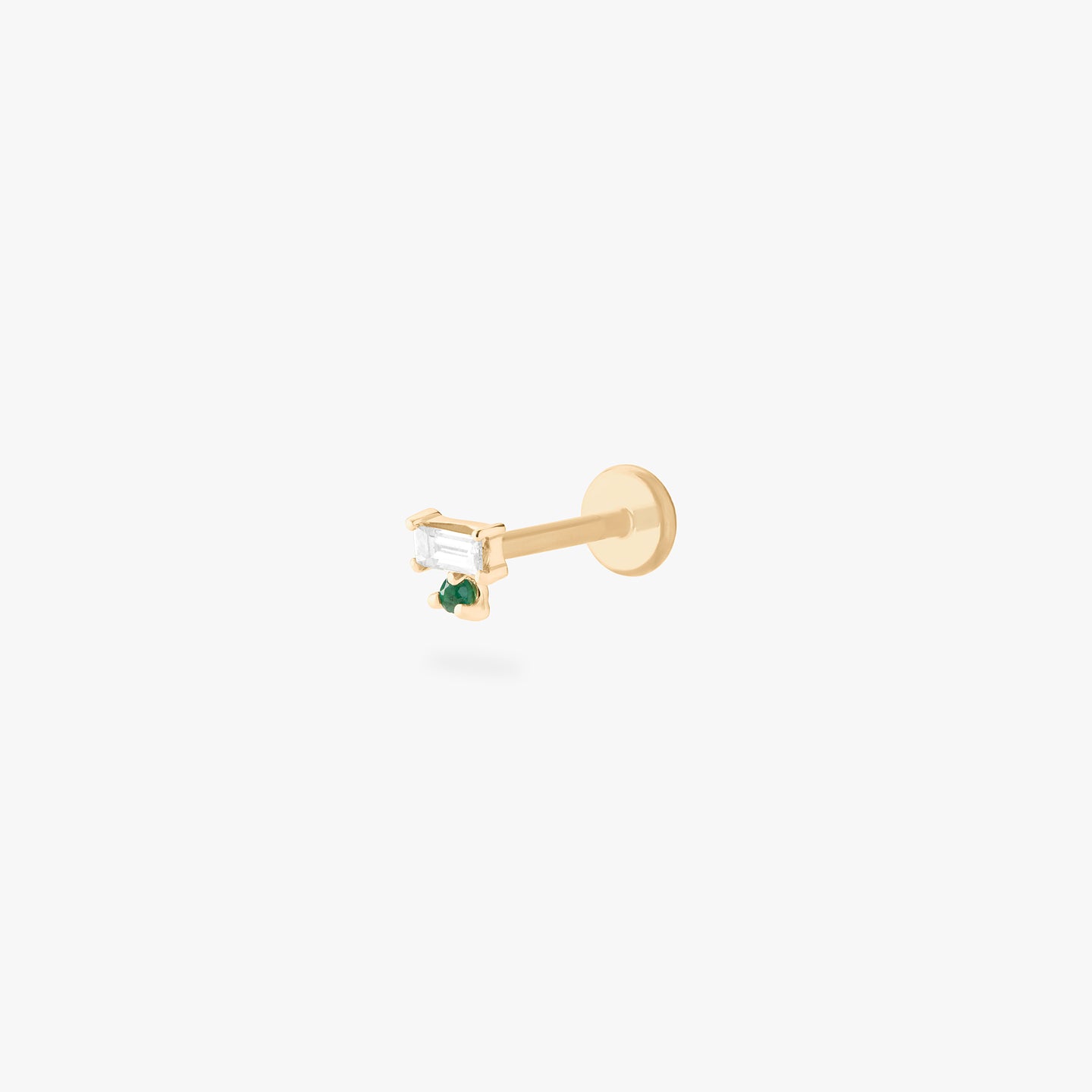 14k gold flatback stud with a natural diamond baguette and emerald stone color:null|gold/green