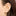 This is an image of a silver flatback stud composed of titanium with a pearl stone stacked over a clear cz stone on ear. [hover] color:null|silver/pearl