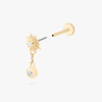 This is an image of a 14k gold flatback that is shaped as a twinkle star with a clear cz and clear cz bezel dangling from it. color:null|14k gold/clear