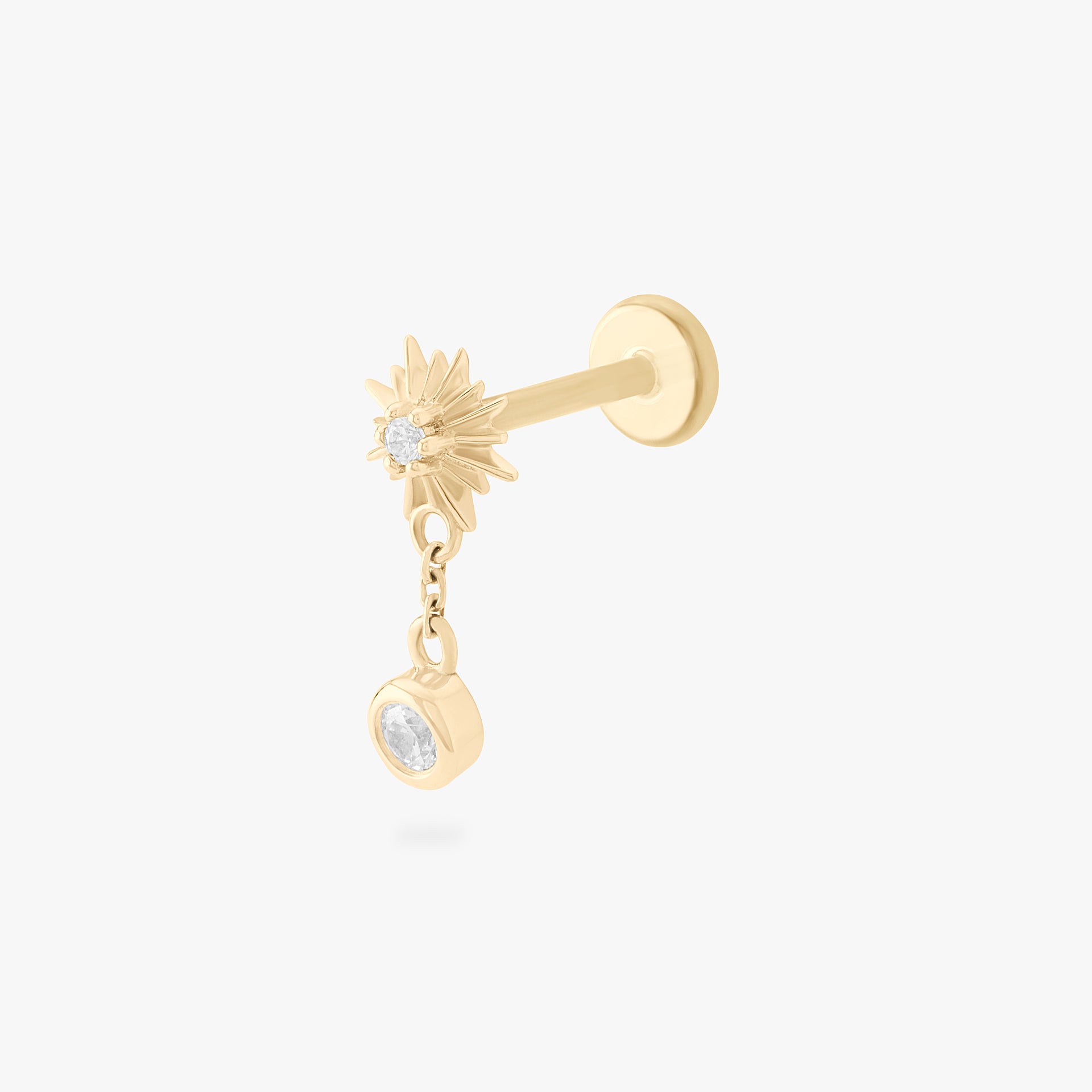 This is an image of a 14k gold flatback that is shaped as a twinkle star with a clear cz and clear cz bezel dangling from it. color:null|14k gold/clear
