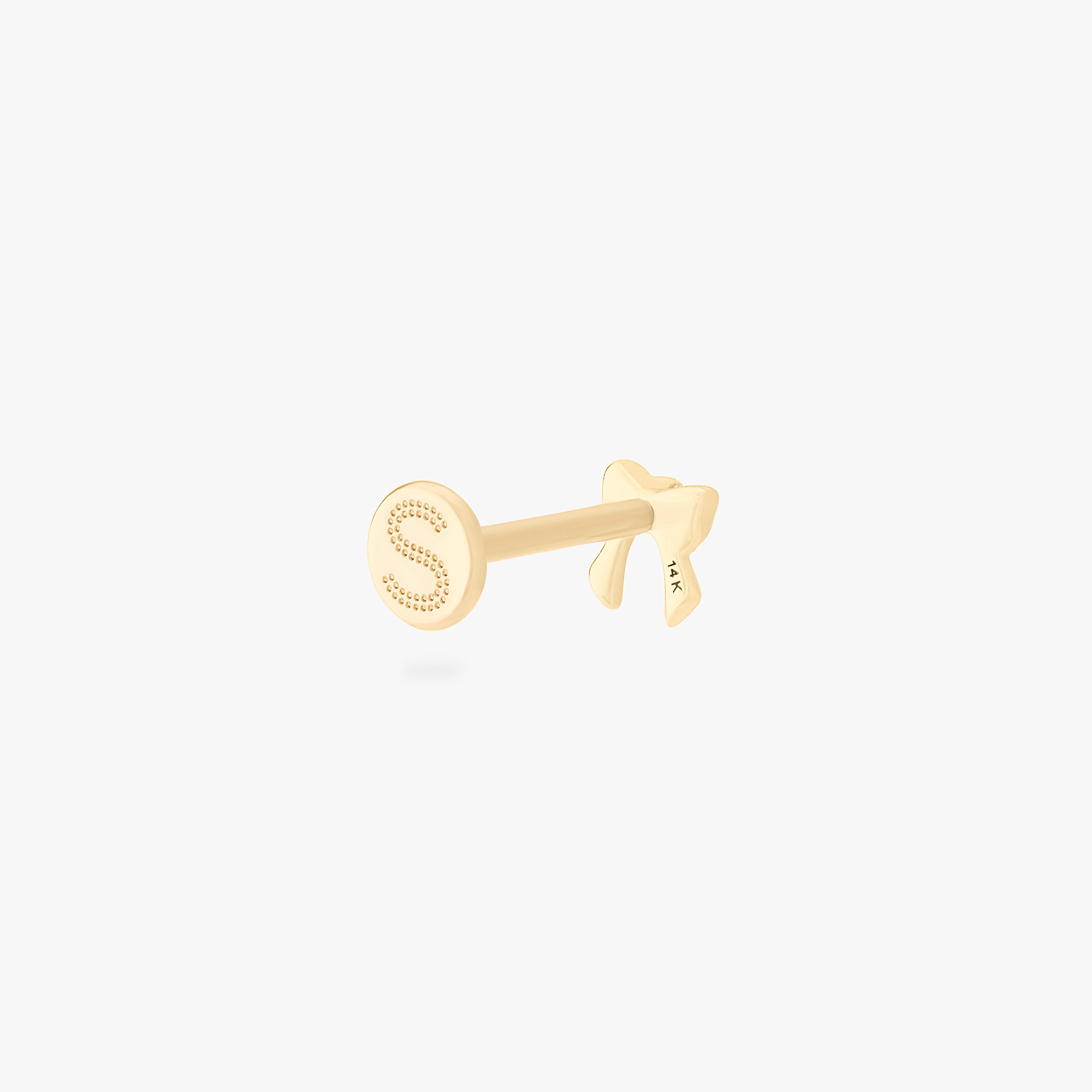 This is a 14k gold flatback stud with a bow shape with a clear cz in the middle. color:null|14k gold/clear